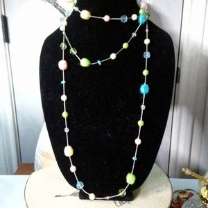 Pale pink pale green pale blue faux Pearl extra long necklace.